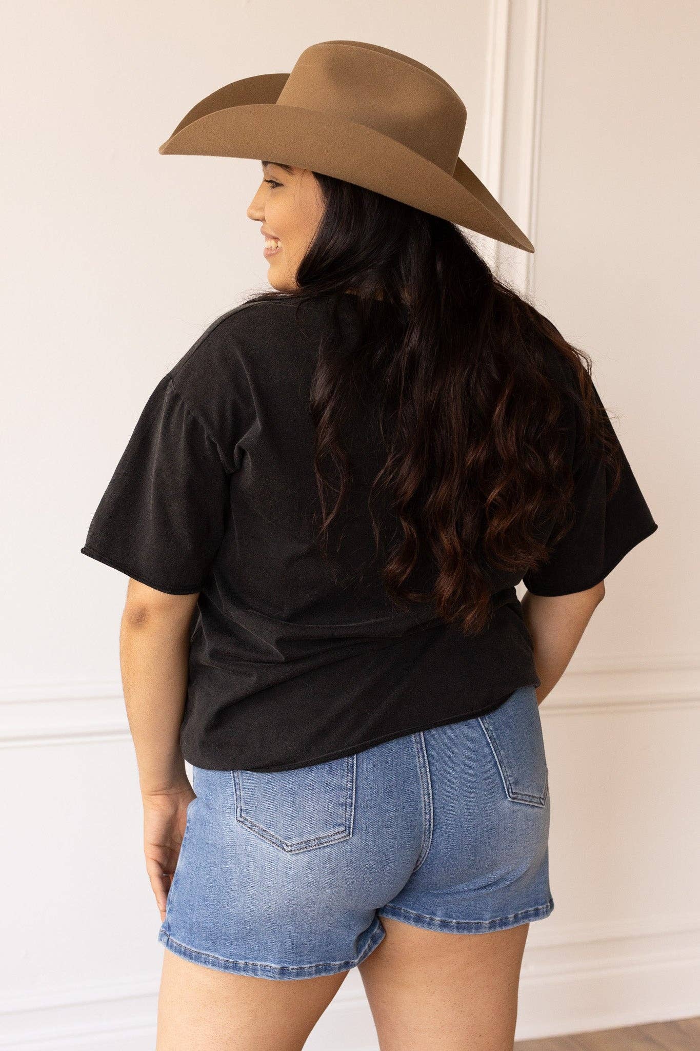 Pink Western Boots on Black Crewneck T-Shirt