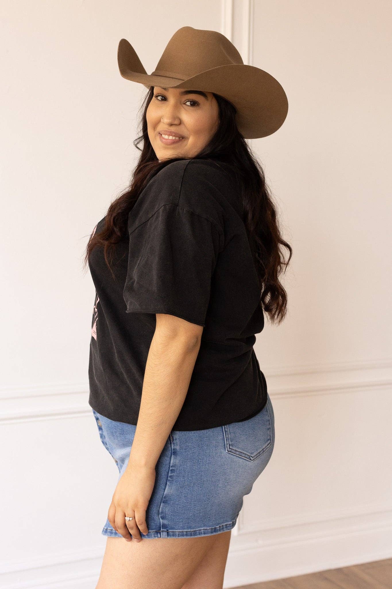 Pink Western Boots on Black Crewneck T-Shirt