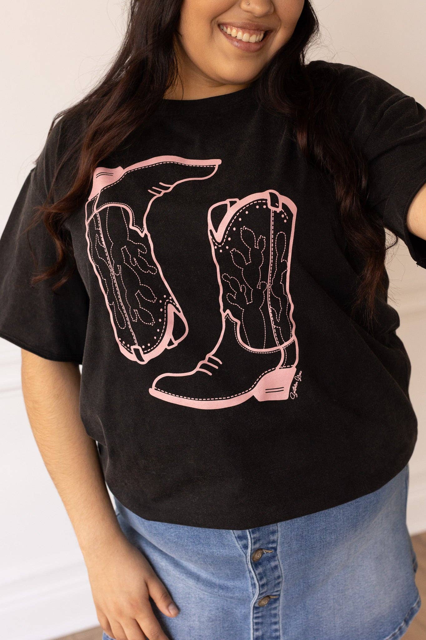 Pink Western Boots on Black Crewneck T-Shirt