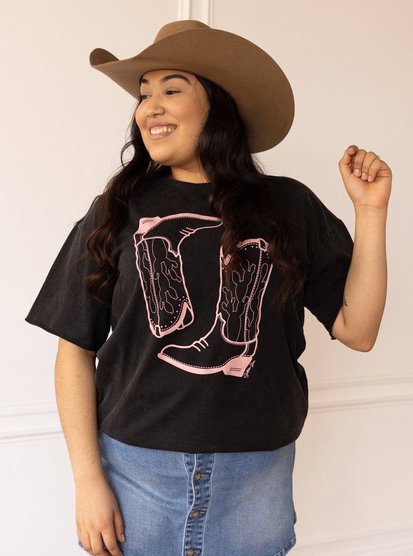 Pink Western Boots on Black Crewneck T-Shirt